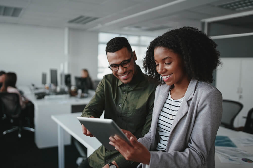 Black Professionals in office setting iStock-1178155113